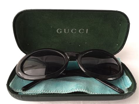 gucci black oval sunglasses|gucci oval sunglasses vintage.